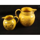 Two 19th Century canary yellow jugs with fruit,