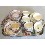 A 19th Century floral tea set and three pink lustre cups and saucers