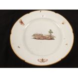 A 19th Century continental porcelain charger with landscape and butterfly decoration,