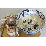 A large Amhurst blue and white floral bowl and two Victorian teapots