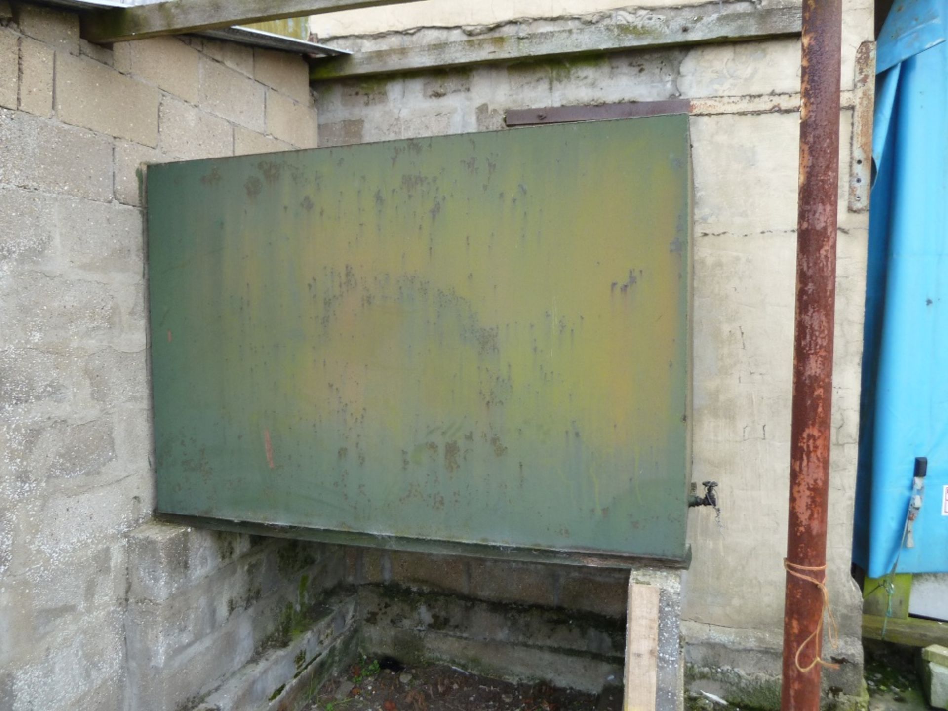 Single skin steel tank 4' x 6' x 4', with filler hose. Stored near Burston.