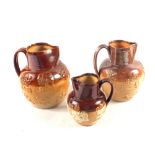 A Doulton Lambeth harvest jug plus two others