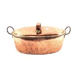 A 19th Century oval seamed Copper fish kettle and cover stamped J.M.