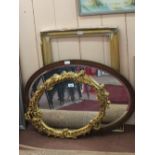 Two oval mirrors and a giltwood picture frame