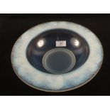 A desirable French opalescent glass bowl with bird and floral moulded rim, marked P'Davesn,