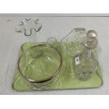 A cut glass decanter,