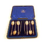 A cased set of Silver teaspoons and tongs