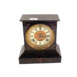 An Ansonia mantel clock in black japanned case