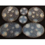 A six piece opalescent glass fruits-de-la-mer set comprising two oval,