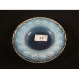 An opalescent glass dish with circular moulding,