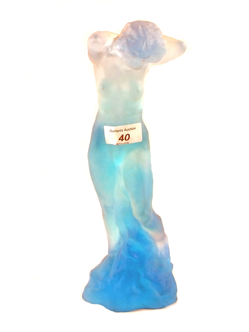 A French pate-de-vere blue frosted glass standing unclad lady by Daum,