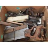 A box of various woodworking tools