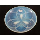 A French opalescent glass bowl with stylised leaf moulded decoration by Sabino,