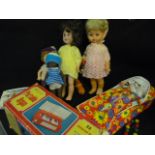 Box containing Various Dolls