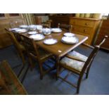 Oak Refectory Table and 6 Chairs of which 2 Dinners and 2 Carvers