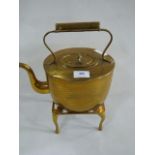 brass kettle on stand