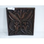 carved wooden plaque