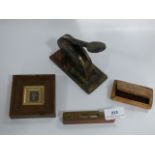Framed Penny Black, used snuff box, stamp press and small level