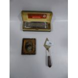 Chromatic Harmonica, miniature trowel and photograph