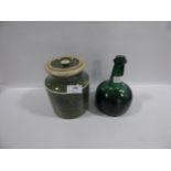 Snuff and tobacco container with green glass musical bottle