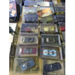 Fourteen Boxed 007 Cars