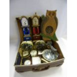 Small Suitcase of Various Clocks