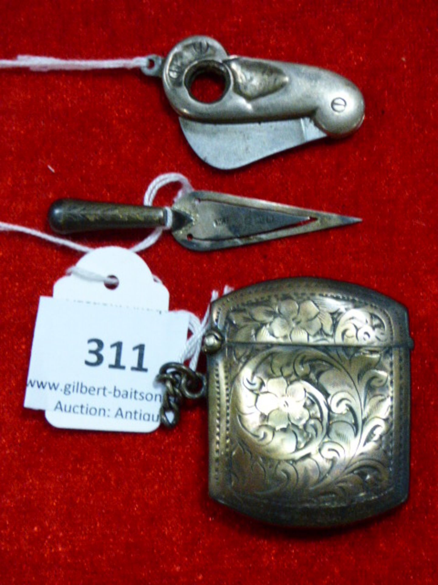 Silver Vesta Case, Cigar Cutter and Bookmark Shaped as a Trowel