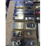 Fourteen Boxed 007 Cars
