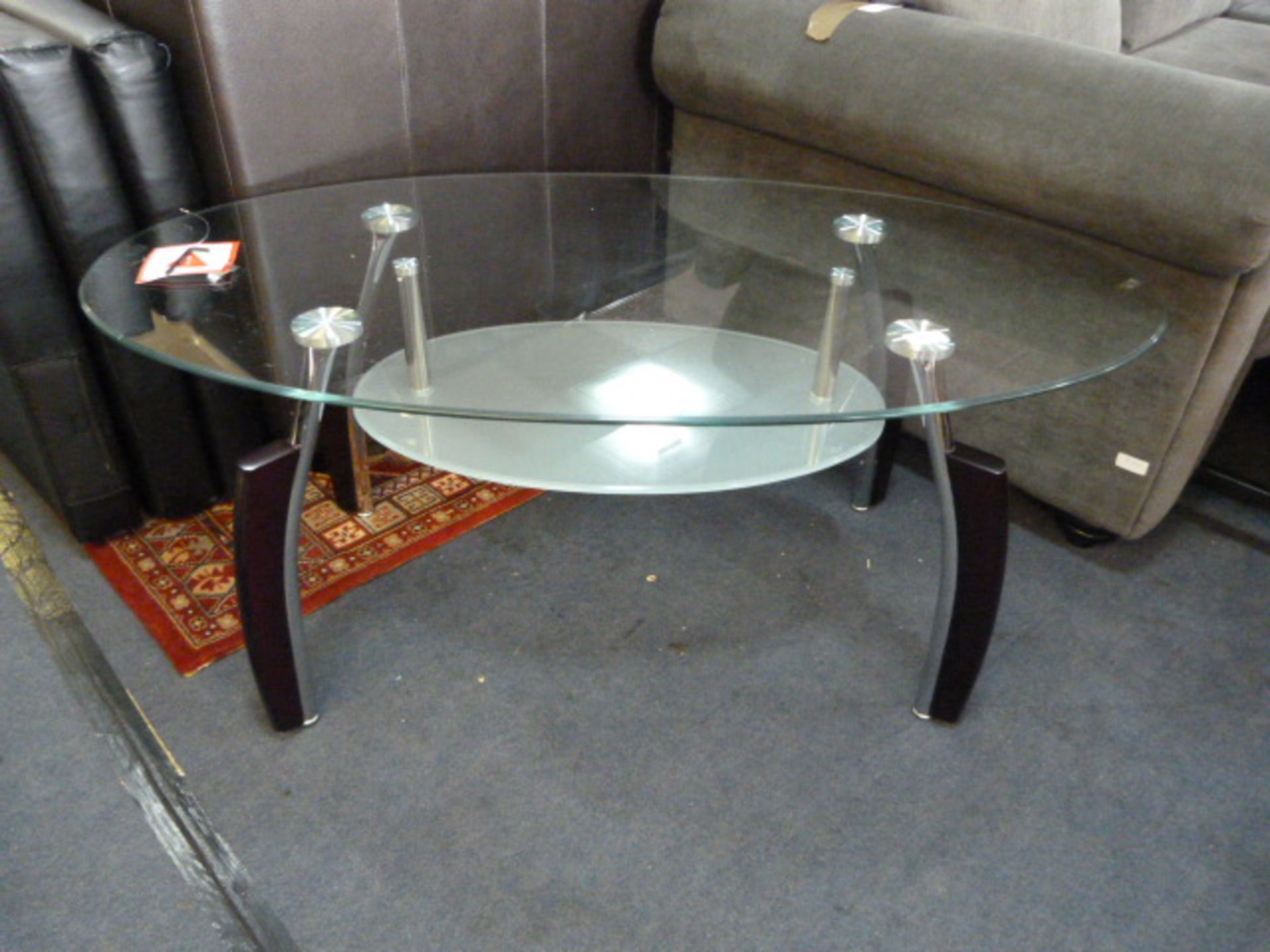 Oval Glass Coffee Table in Chrome + Black Finish