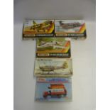 Four Model Aeroplanes and a Open Top Bus in Box