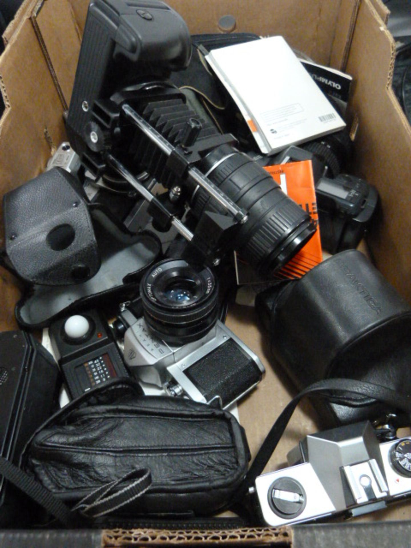 Assorted SLR Cameras Including Practica, Canon, etc.