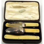 A Victorian silver and ivory solitaire travelling cutlery set, comprising; spoon, knife and fork