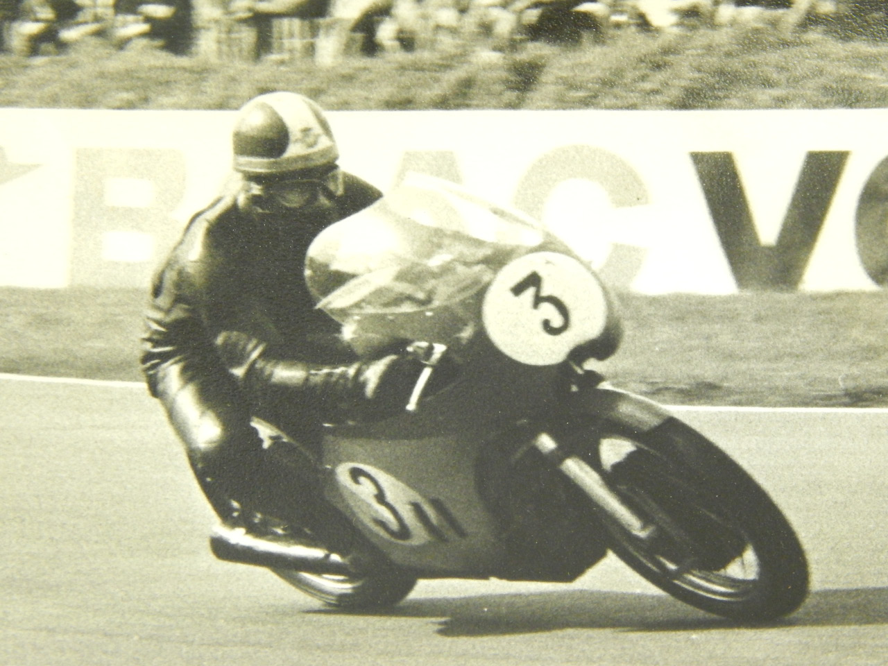 Black and white photographs from the 1960's of motor cycle racing. - Image 6 of 6