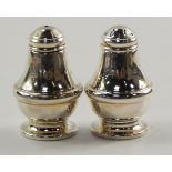 A silver salt and pepperette, of baluster form, Birmingham 1989, boxed, 0.73toz.