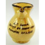 A French mottled and slip pottery wine ewer, marked A.C-Savoie Ralle De Monte Carlo Chambery 20-1-