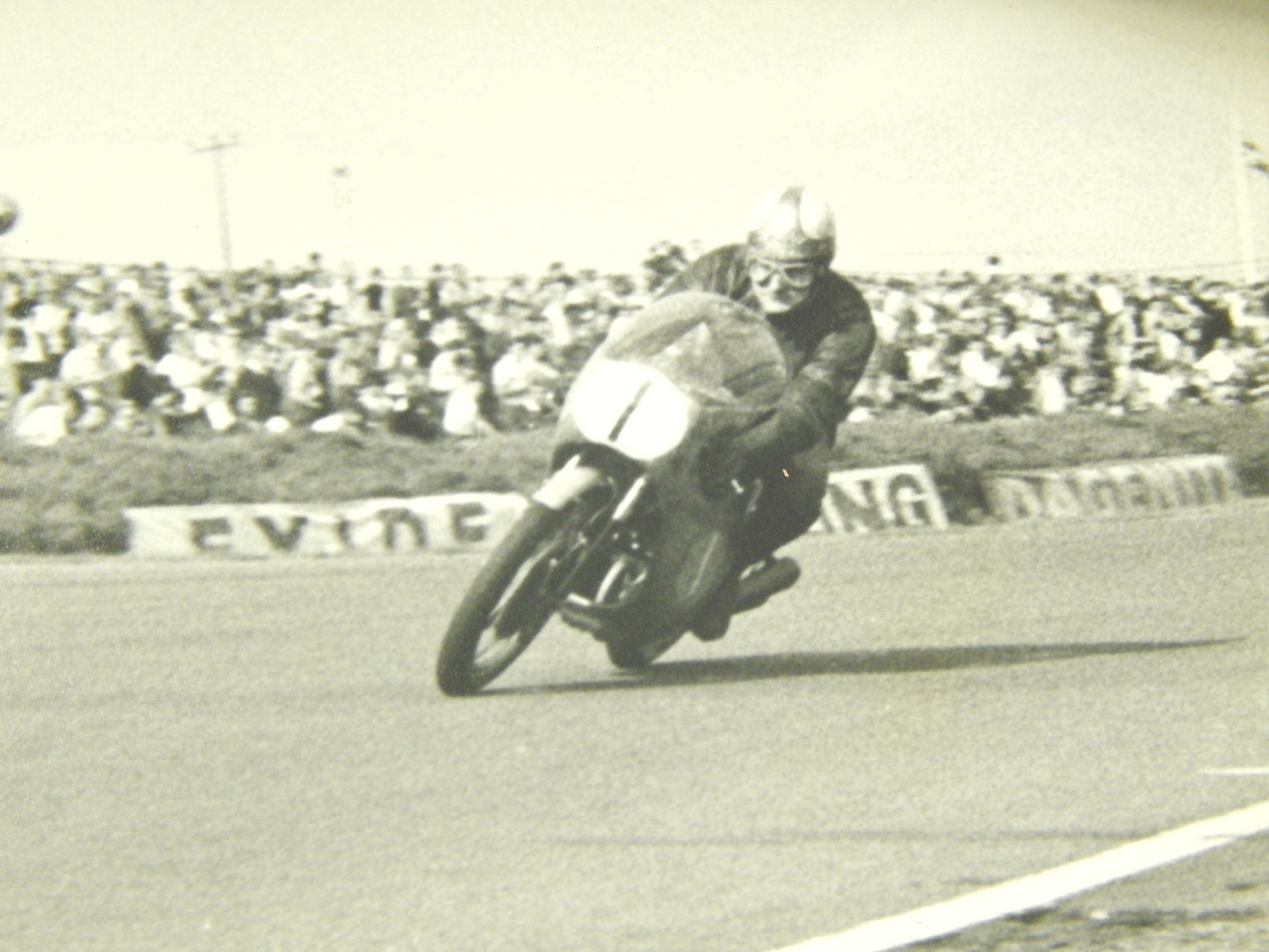 Black and white photographs from the 1960's of motor cycle racing. - Image 5 of 6