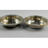 A pair of George V silver dishes, for Harrods, London, Sheffield 1912, 11.77toz.