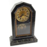 A UCC, American, faux marble and ebonised mantel clock, early 20thC, papered brass dial bearing