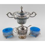 A Victorian plated pot pourri vase and cover, of trophy form with pierced foliate scroll banding and