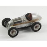 A Shuco Studio 1050 Mercedes clockwork model car.