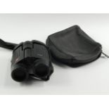 A pair of Leica Trinovid 10 x 32BA binoculars, soft cased.