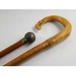 A malacca walking cane, with a circular silver knop, Birmingham 1923, 90.5cm long, together with a