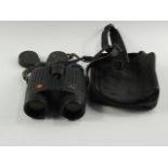 A pair of Leica Trinavid 8 x 32BA binoculars, soft cased.