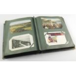 A postcard album, containing Edwardian topographical and sentimental postcards, and a set of W & A K