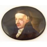 A 19thC porcelain portrait plaque, entitled Wieland, formed as a gentleman quarter profile, in