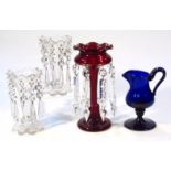 Various glassware, comprising an early 20thC ruby glass lustre, with castellated top on inverted