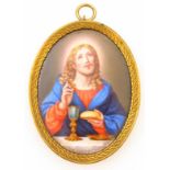 A 19thC German porcelain miniature, the oval plaque hand painted with Christ breaking bread before