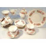 A 20thC Colclough bone china part tea service, each piece transfer printed with flowers to include