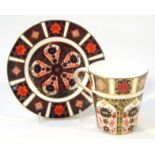 A Royal Crown Derby Imari pattern coffee cup and saucer, 18cm dia. printed marks beneath. (2)