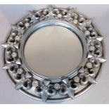 A 20thC Alan Wallis decorative mirror, of circular outline set with a bead and fleur-de-lys pattern,